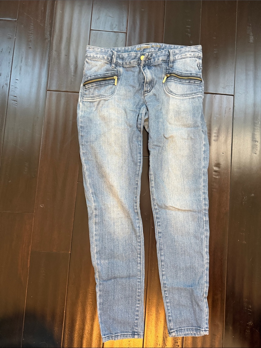 Michael Kors Light Wash Skinny Jeans with Gold Zipper Accents